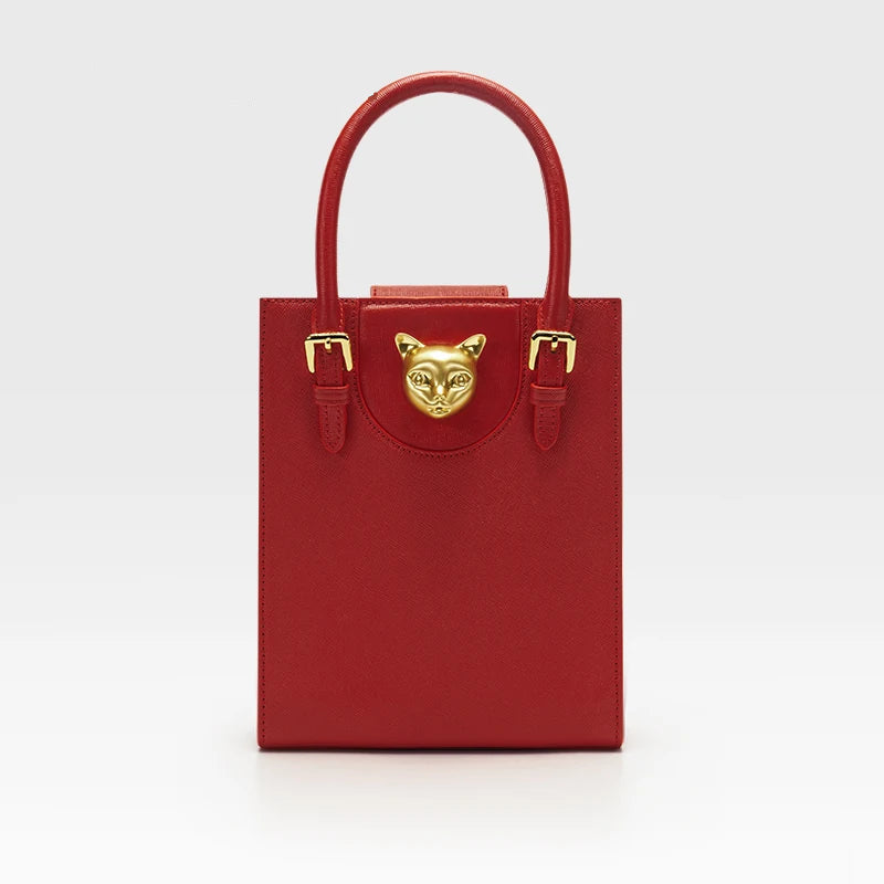 Mini Tote i Top Grain-läder – Guldfärgat Kattspänne & Justerbar Rem, 17,5x6,5x21,5 cm Handväskor Ali Röd