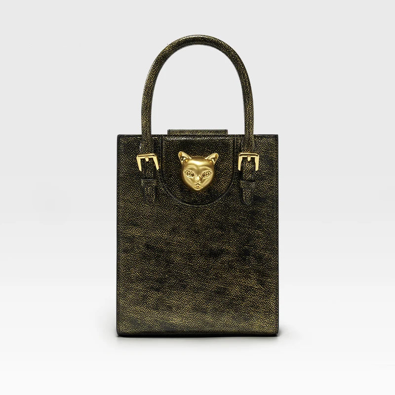 Mini Tote i Top Grain-läder – Guldfärgat Kattspänne & Justerbar Rem, 17,5x6,5x21,5 cm Handväskor Ali Svart guld